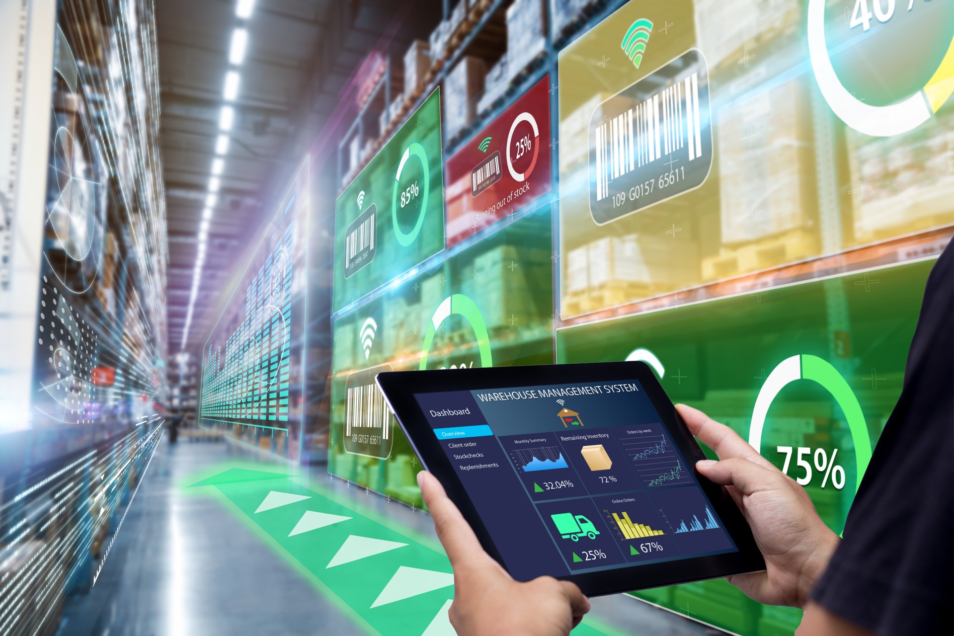warehouse worker using inventory management software and analytics to manage stock in an industry 5.0 smart warehouse