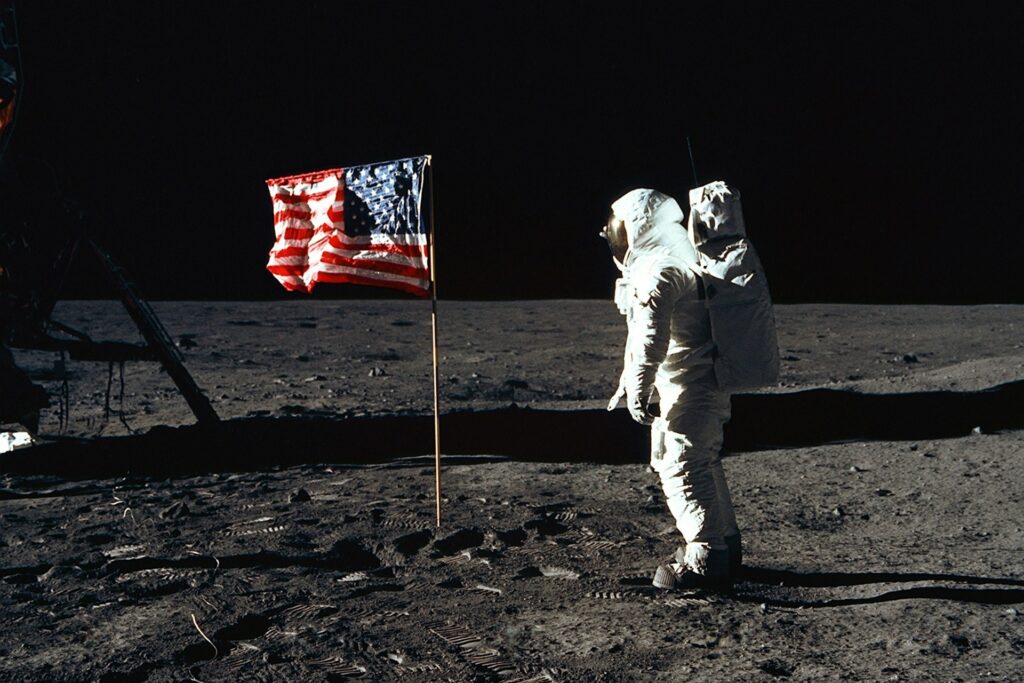 Astronaut on the moon with an American flag