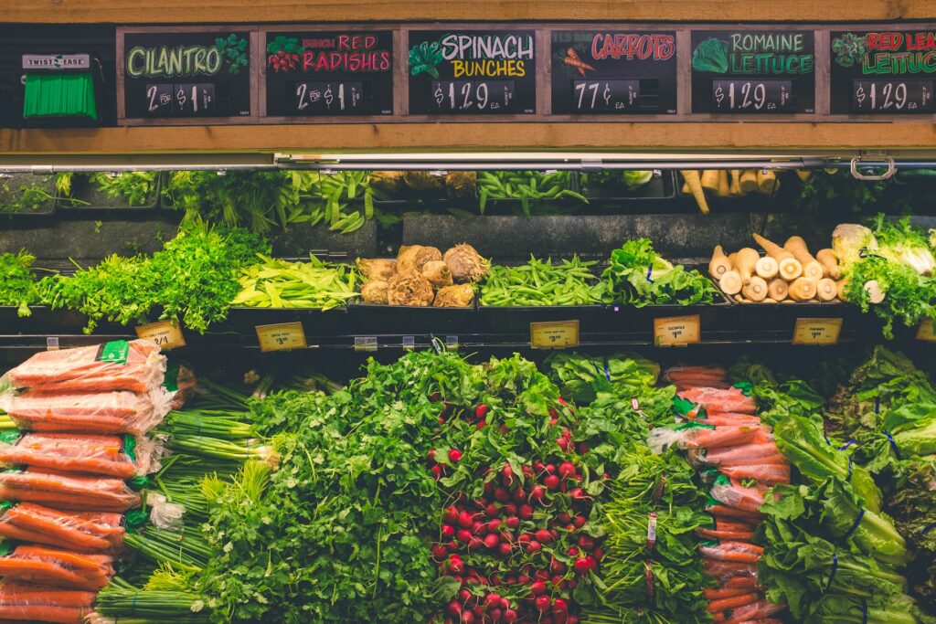Produce section with leafy greens