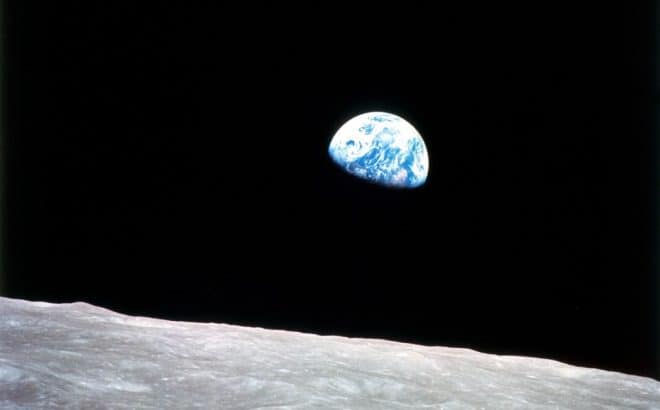 Earth rising in the sky from the moon