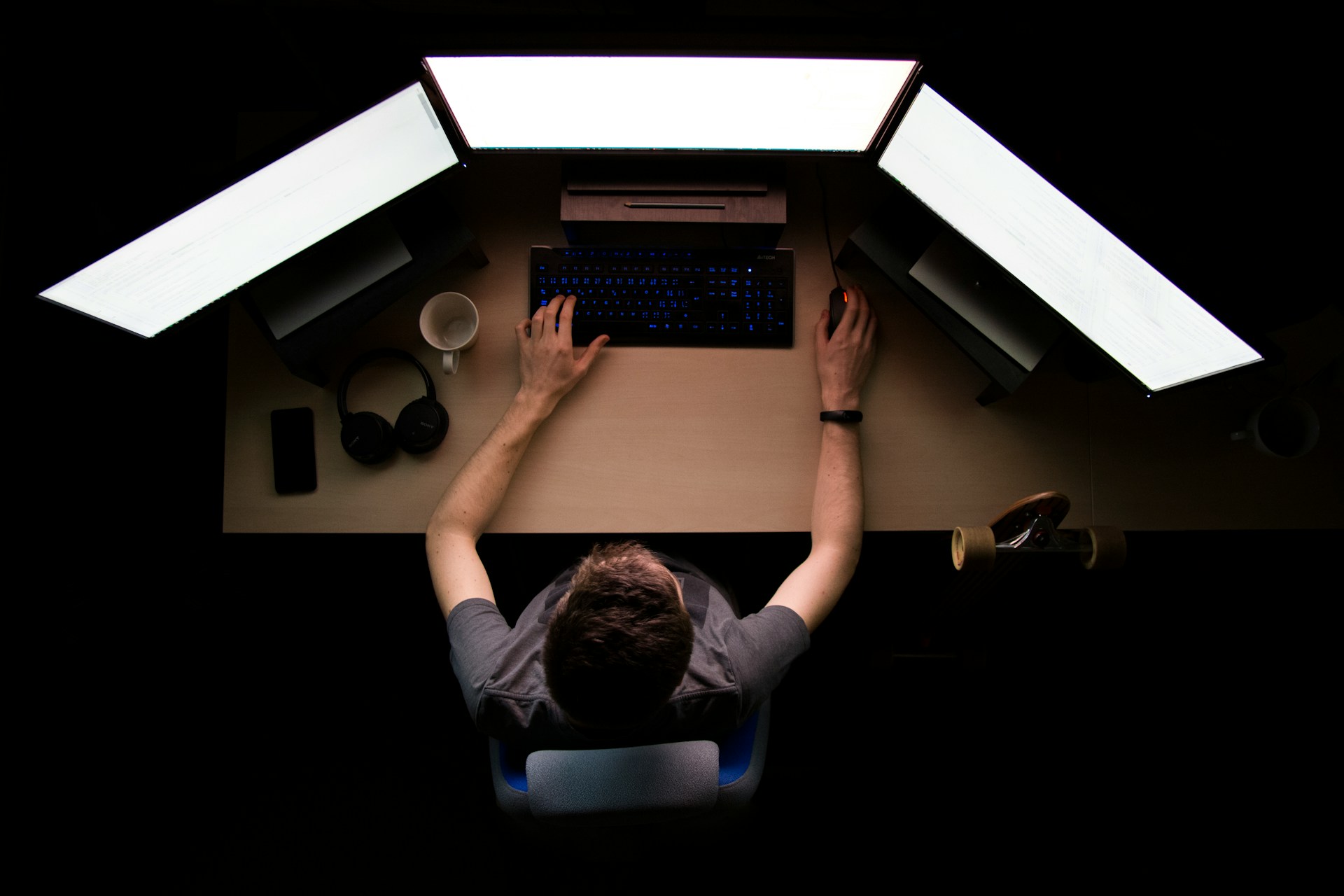 A man sitting at a computer.