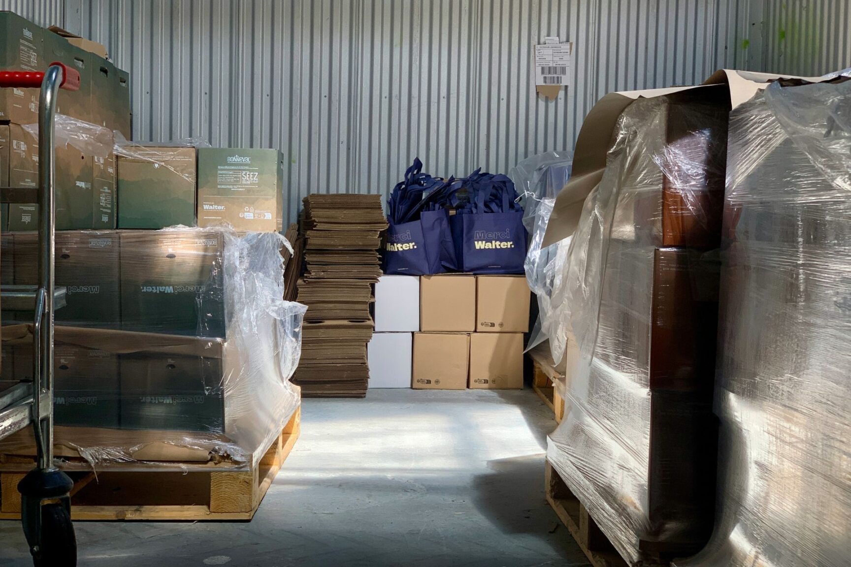 Organized pallets of merchandise ready for shipment in a warehouse.