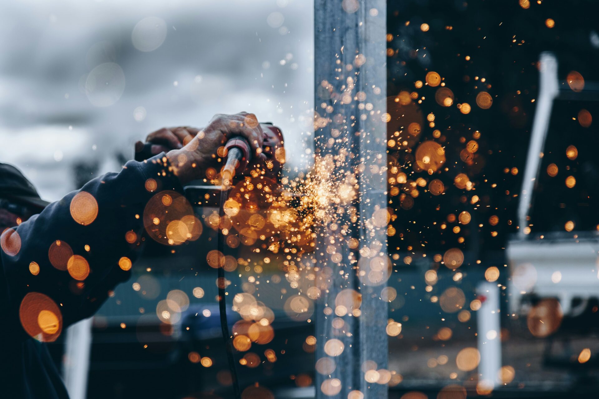 sparks flying from a metal grinder