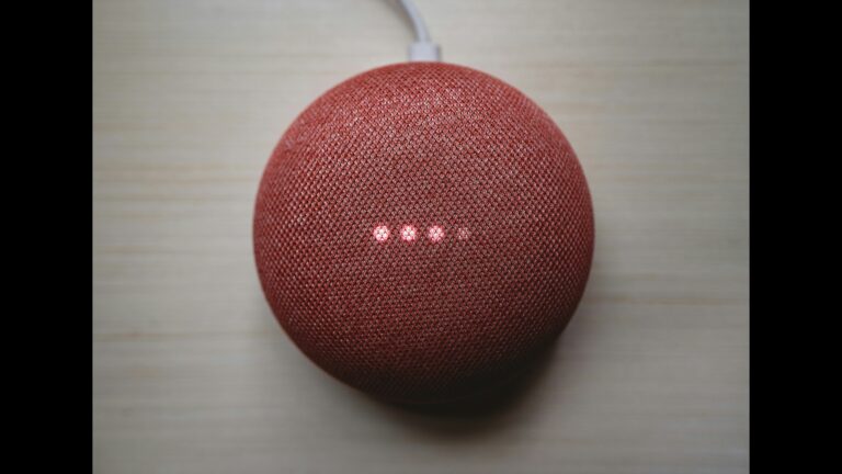 A round red voice assistant device