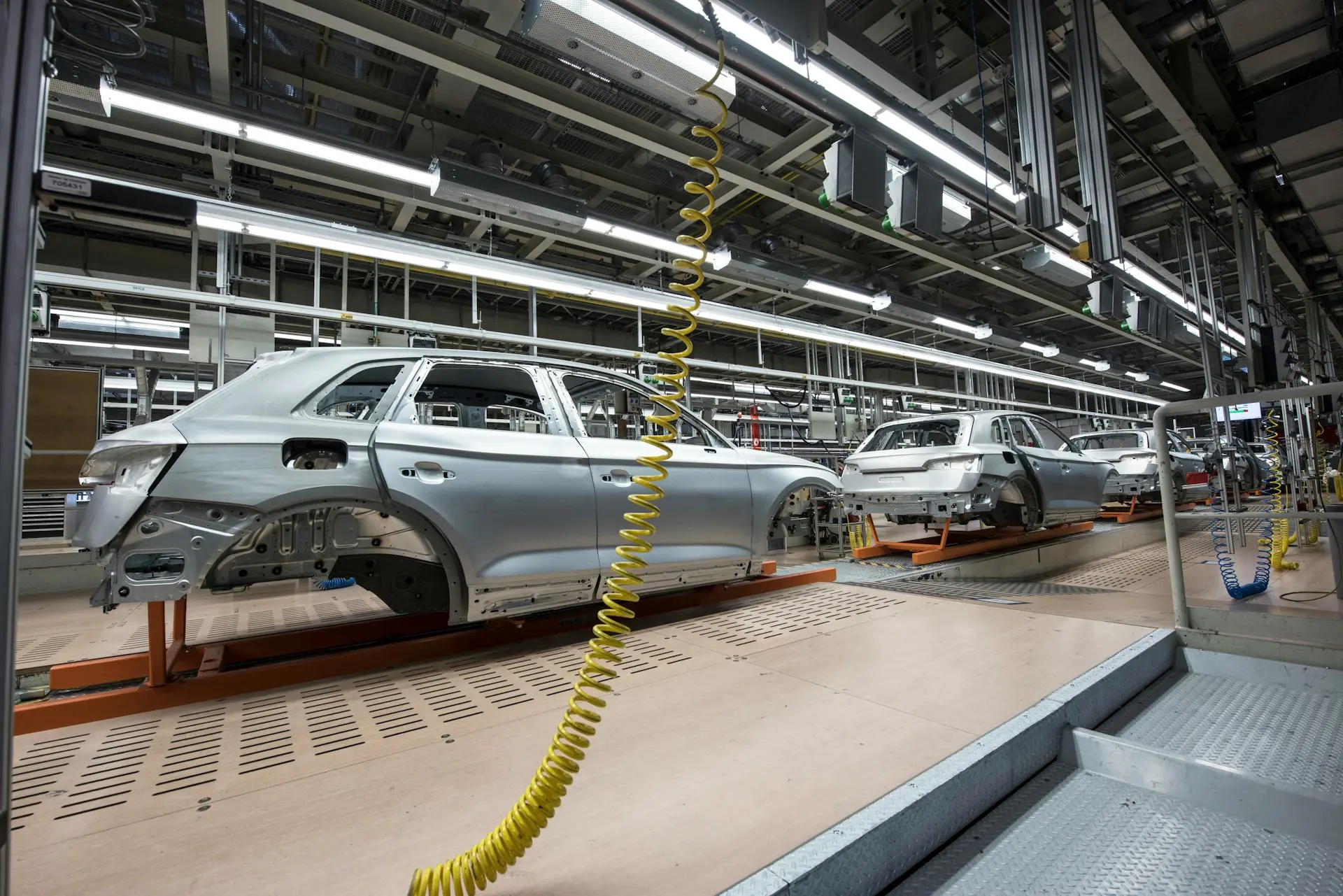 Cars in a manufacturing line