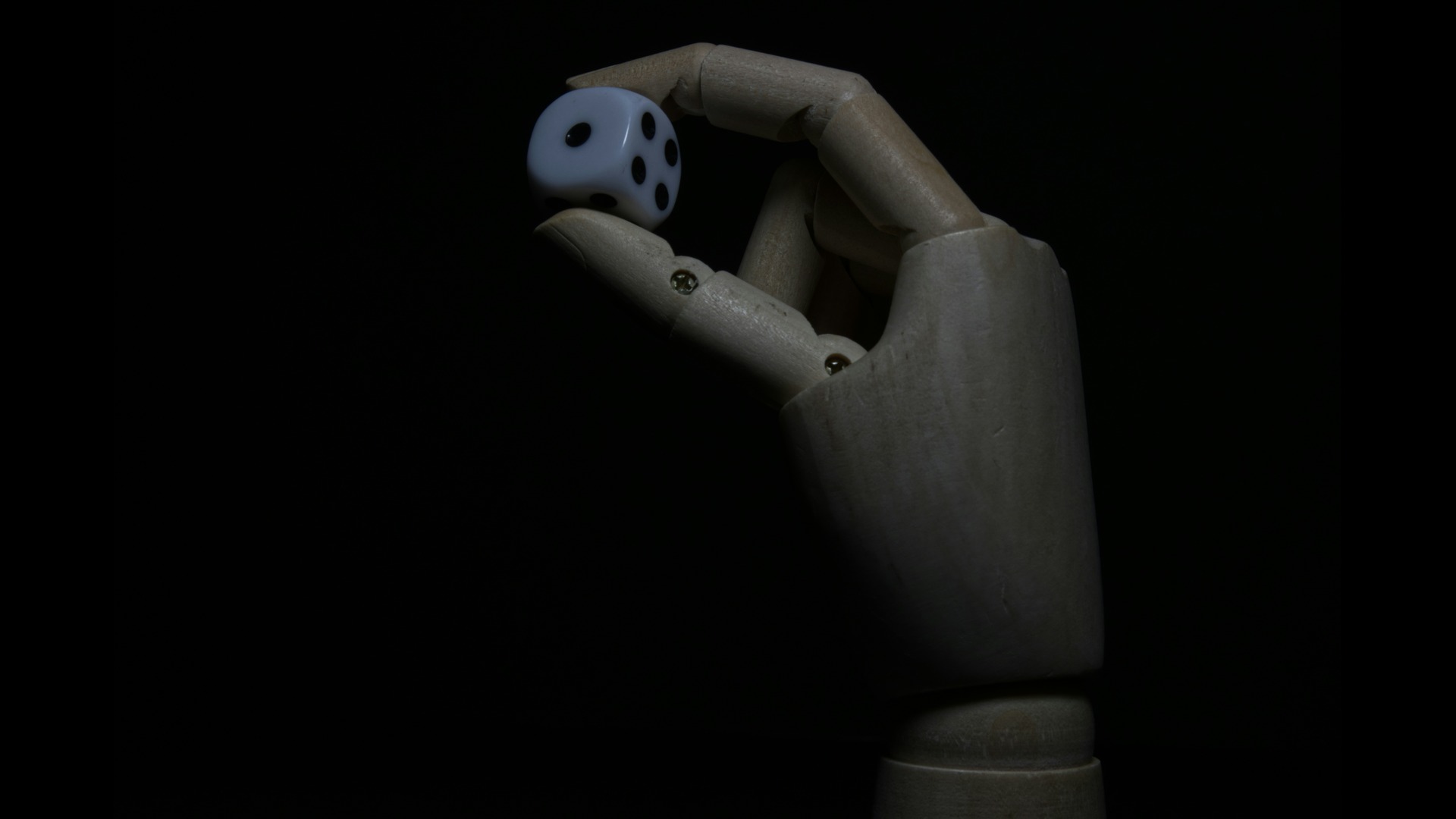 a robot had holding a die