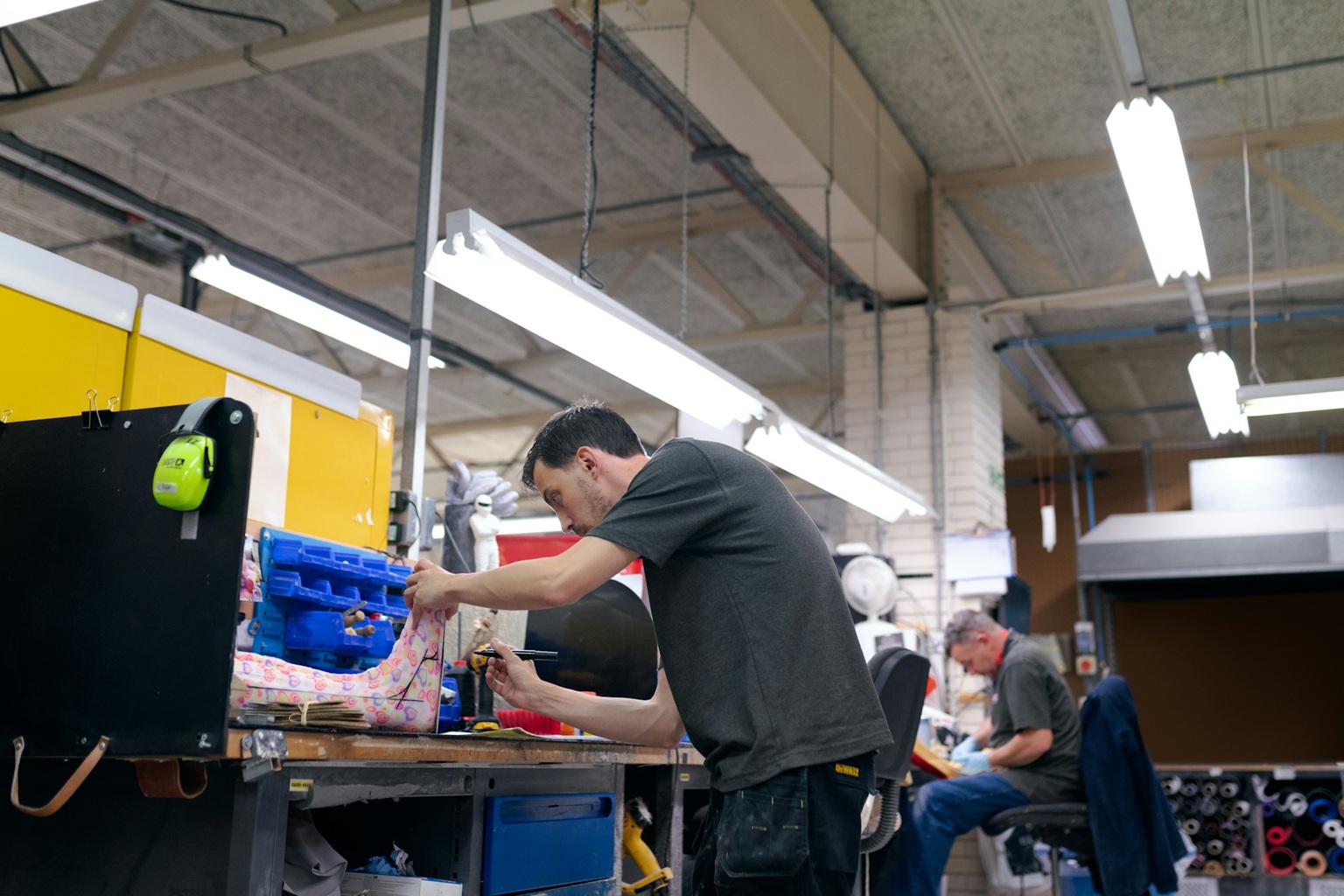 two men collaborating on a manufacturing project